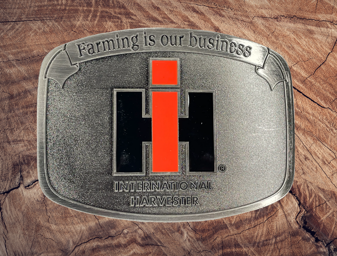 Curved Rectangle Shape Licensed International Harvester Buckle Fits 1 1/2 inch wide belts Approx. size 2 3/4"H x 3 3/4"W