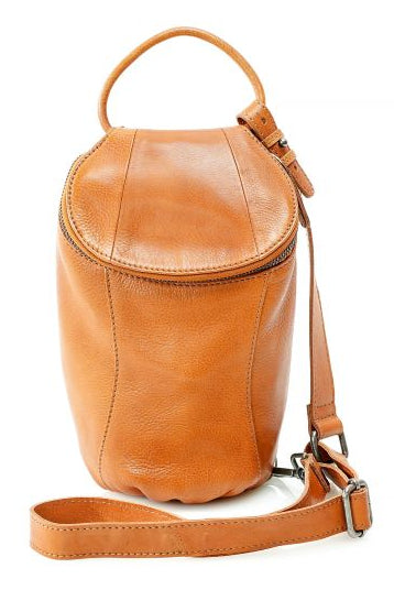Our Lea Anne bag is great for some one who is has the Minimalist mind set. Not to big or small. The Lea Anne may be hand carry or be worn sling style. It has a back open top pocket on the back side, the inside is one main pocket with one smaller zippered and one open top pocket. Made from soft tumbled leather and lined with cotton fabric. Available now at our store in Smyrna, TN.

Measurements: 6" x 1.5" x 10"