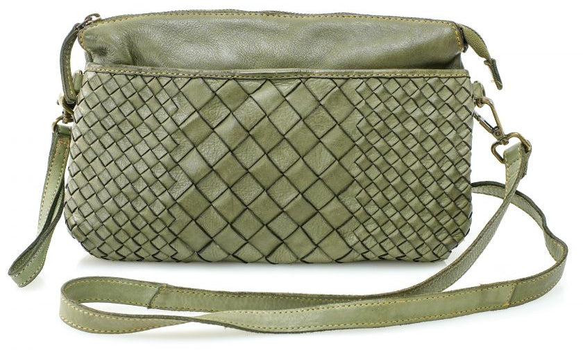 The Eve is made from soft tumbled leather and has a Woven front. The back side has a zippered pocket that will hold most smaller phone sized items. The main open inside pocket has one zippered pocket, 2 open top pockets 4 card size slots and one more smaller pocket next to to the cards. May be carried with the Wrist loop or as a Crossbody style with the included strap. The liner is a cotton fabric. Available now at our store in Smyrna, TN!

Measurements: 10" x 1" x 6"