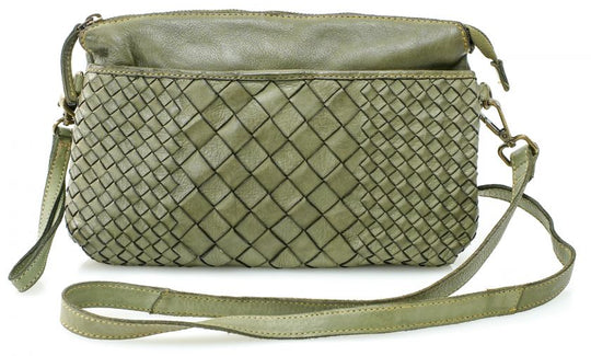 The Eve is made from soft tumbled leather and has a Woven front. The back side has a zippered pocket that will hold most smaller phone sized items. The main open inside pocket has one zippered pocket, 2 open top pockets 4 card size slots and one more smaller pocket next to to the cards. May be carried with the Wrist loop or as a Crossbody style with the included strap. The liner is a cotton fabric. Available now at our store in Smyrna, TN!

Measurements: 10" x 1" x 6"