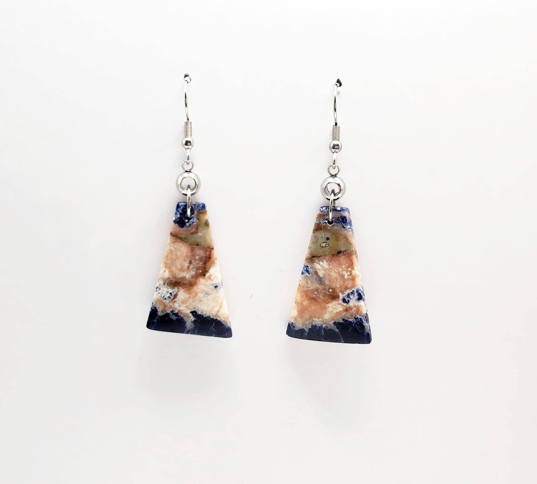 -The earrings are stainless steel with Sodalite stone -The ear wires are stainless steel. -The earrings measure 7/8" wide -They measure 2 1/4" in total length -Medium weight -The earrings pictured are the ones you will receive. They are the only pair like this. Stocked at our Smyrna, TN shop down I-24 from downtown.