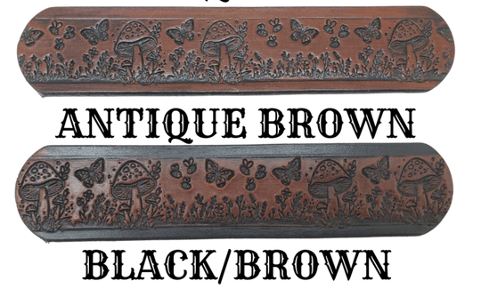 Our 1 1/2" Throwback Groovy Mushroom is a solid strip of USA veg-tan cowhide, embossed with a scene of Mushrooms, Flowers, and Butterflies down length of belt. It is hand finished in&nbsp;3 finishes, with smooth beveled, and painted edges, approx. 1/8" thick. Sizes available are&nbsp;34" to 44" from buckle end to hole most worn.&nbsp; Buckle is an Antique Silver finish brass, held in place with 2 snaps for easy buckle change. Crafted by hand at our Smyrna, Tennessee shop, close to Nashville.