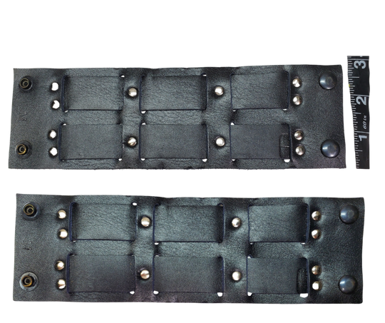 Show off your rocker style with our 2 3/4" Wide Laced Leather Cuff. Featuring two leather strips woven through a broad band, it channels that edgy Rocker vibe. Crafted from soft leather, it promises a comfy fit all day long. Hurry—limited quantities available at our Smyrna, TN store!

PLEASE NOTE SIZING (see picture) SMALL 8", MEDIUM 8 1/2", LARGE 9". Sizing may vary slightly with each cuff.