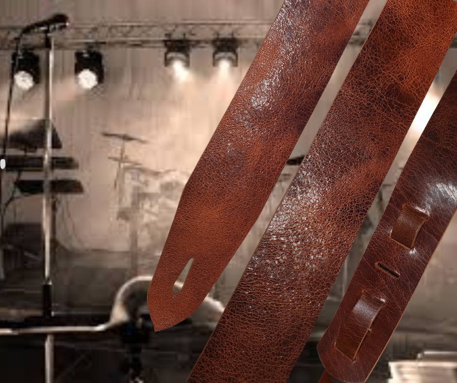 Lower Broadway where so many get their start in the Nashville! Long shifts where you hone your craft & meet players from all backgrounds. "This Basic Tan 2" or 2 1/2" wide Guitar Strap is a nod to playing those Honky Tonks. The strap is approx. 1/8" thick Crackle finish Water Buffalo that will after a few gigs will feel like your old boots. The classic adjustment style goes from approx. 42" to 56". Made just outside Nashville in our Smyrna, TN. shop. 