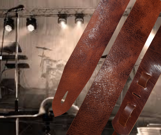 Lower Broadway where so many get their start in the Nashville! Long shifts where you hone your craft & meet players from all backgrounds. "This Basic Tan 2" or 2 1/2" wide Guitar Strap is a nod to playing those Honky Tonks. The strap is approx. 1/8" thick Crackle finish Water Buffalo that will after a few gigs will feel like your old boots. The classic adjustment style goes from approx. 42" to 56". Made just outside Nashville in our Smyrna, TN. shop. 