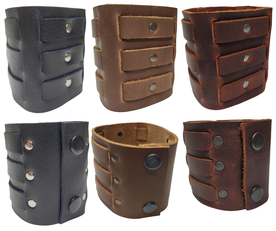 Show off your rocker style with our 2 3/4" Wide Laced Leather Cuff. Featuring three leather strips woven through a broad band, it channels that edgy Zack Wilde vibe. Crafted from soft leather, it promises a comfy fit all day long. Hurry—limited quantities available at our Smyrna, TN store!

PLEASE NOTE SIZING (see picture) SMALL 8", MEDIUM 8 1/2", LARGE 9". Sizing may vary slightly with each cuff.