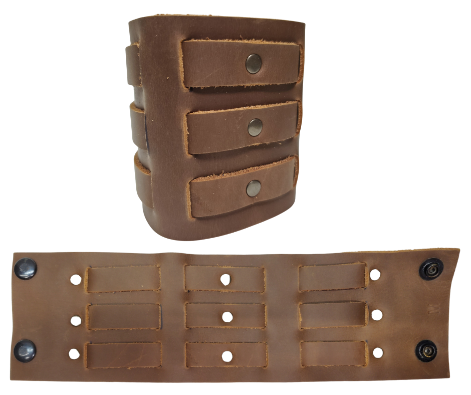 Show off your rocker style with our 2 3/4" Wide Laced Leather Cuff. Featuring three leather strips woven through a broad band, it channels that edgy Zack Wilde vibe. Crafted from soft leather, it promises a comfy fit all day long. Hurry—limited quantities available at our Smyrna, TN store!

PLEASE NOTE SIZING (see picture) SMALL 8", MEDIUM 8 1/2", LARGE 9". Sizing may vary slightly with each cuff.