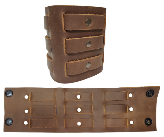 Show off your rocker style with our 2 3/4" Wide Laced Leather Cuff. Featuring three leather strips woven through a broad band, it channels that edgy Zack Wilde vibe. Crafted from soft leather, it promises a comfy fit all day long. Hurry—limited quantities available at our Smyrna, TN store!

PLEASE NOTE SIZING (see picture) SMALL 8", MEDIUM 8 1/2", LARGE 9". Sizing may vary slightly with each cuff.