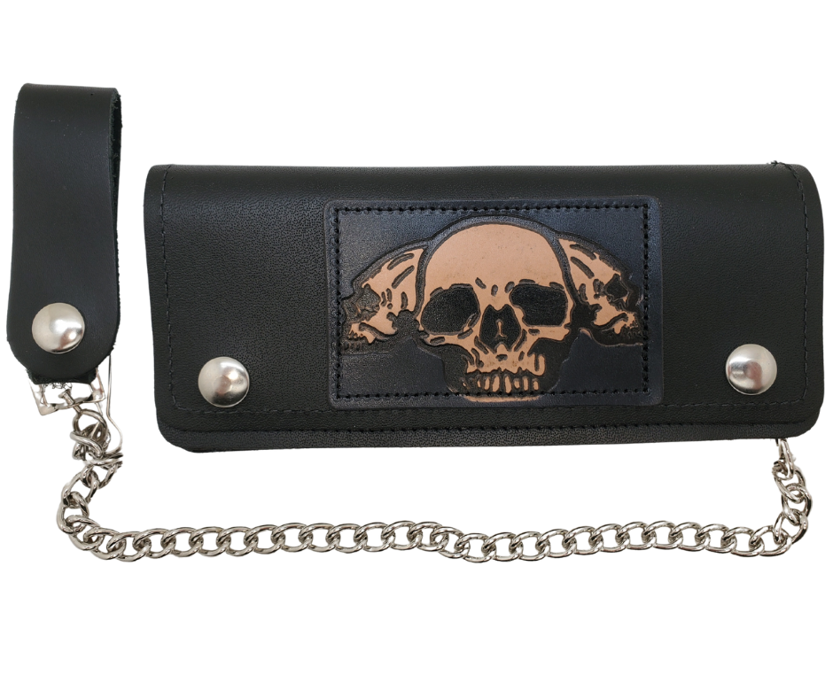 3 Skulls pattern all leather patch on a Classic Style Chain Wallet, great for the Modern minimalist. One credit card slot in the front with 2 main cash or whatever your STUFF is....5 year old receipts, concert stub from high school, the stuff you forgot was in there! Available in our Smyrna, TN shop a short drive from downtown Nashville. Like most wallets with over stuffing will limit the time of use. 