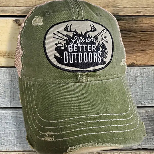The Life is Better Outdoors cap has a silhouetted graphics patch. It's Super soft with rips and tears for that well worn look. Faded green twill front, cream color mesh back with snap back for adjustment. Available online and in our retail shop in Smyrna, TN.