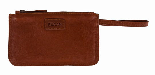 Our Kara wallet is a minimalist, sleek wristlet made from super soft Nappa leather. It can keep all your credit cards, cash, phone, and knick-knacks safely. Also works as a wristlet or keep it in your favorite bag when you have more stuff. Get yours at our world famous Smyrna, TN leather shop a short Uber ride from downtown Nashville.