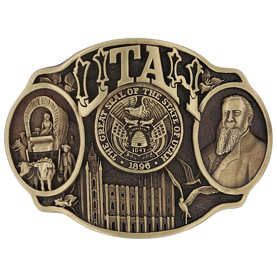 Celebrate Utah State with this buckle highlighting pioneers, Brigham Young, the Salt Lake Tabernacle, and the state seal! Brass plate over a solid cast metal alloy is antiqued and buffed to highlight the details.

Fits 1 1/2" belts and is approx. 3" tall x 4" across. Available at our shop just outside Nashville in Smyrna, TN. Made by Montana Silversmiths.