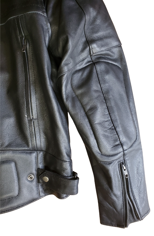 European style collar. It also has decorative black on black stripes and 2 reflective piping strips across front and back. Padding across shoulders, arms, and lower back. Four outside pockets, zippered vents, and two inside concealed carry pockets. The jacket also comes with a full sleeve zip out liner and is available in sizes from M to 5XL. You can find this jacket in stock at our Smyrna, TN shop, only 30 minutes away from downtown Nashville.