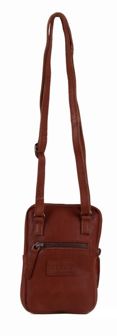 Our IVY Phone Crossbody Bag combines practicality with style. Made of luxurious Nappa leather and featuring high-quality brass hardware, this everyday bag has a unique crossbody design that allows you to keep all your essentials, including your smartphone, in one place. Come check out our local shop in Smyrna, TN, just a short distance from Murfreesboro!