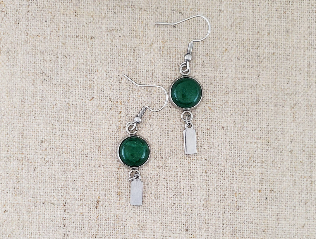-The earrings are stainless steel with Green Agate stone -The ear wires are stainless steel. -The earrings measure 1/2" wide -They measure 1 7/8" in total length -Light weight -You will receive earrings similar to what is pictured here. Stocked at our Smyrna, TN shop down I-24 from downtown.