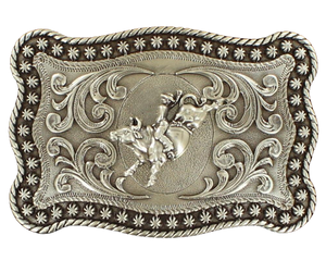Imagine holding a beautifully designed rectangular belt buckle that captures the exhilarating rush of the Eight Second Bullride. It features a Western-inspired rope and beaded edge, along with a bold depiction of a Bullrider in a Antique Silver color. Measuring approximately 3" tall by 4" wide, it comfortably fits belts up to 1 1/2" wide. You can find this amazing buckle at our retail shop in Smyrna, TN, just outside Nashville, or conveniently purchase it from our online store. Imported