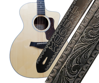 Great Musicians, Singers and great songs have been a staple for years in Nashville. Be on your way starting your journey with this 2" or 2 1/2" main Body of the Guitar strap. It is approx. 1/8" thick Cowhide with a CUSTOMIZABLE NAME FONT. The classic adjustment style goes from approx. 42" to 56" at it's longest . Made just outside Nashville in our Smyrna, TN. shop.