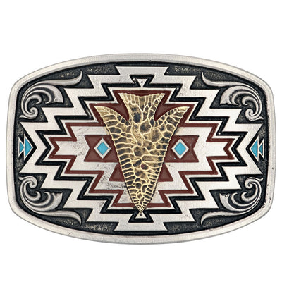 This Radiating Center of it All Arrow Belt Buckle is a curved, rectangular Attitude cast buckle that is hand-painted, radiating it's center arrow design. A gold-finished arrow sits front and center, surrounded by geometric etched patterns painted in reds and turquoise-blues. The pattern is surrounded by faint filigree and a low-profile trim on the outside. Fits 1 1/2" belts and is approx. 3" tall x 4" across. Available at our shop just outside Nashville in Smyrna, TN.