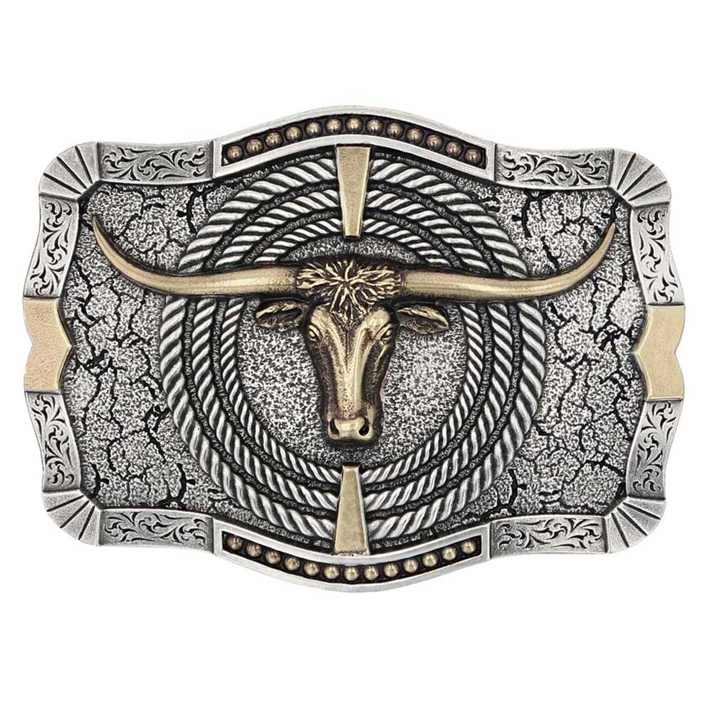 Show off your Ropin' Ready Attitude buckle featuring a gold-tone longhorn bull circled by three layers of silver-toned rope, on a cracked earth background. Gold accents in each direction with gold-toned beads and etched filigree in the silver-tone border. Antiquing highlights the detail and care that is in the design. Standard 1.5 inch belt swivel. In stock at our Smyrna, TN shop not far from wild Broadway in Nashville!

Material: Silver and gold over a white metal alloy. Paint.
Dimensions: Approx. 4x3