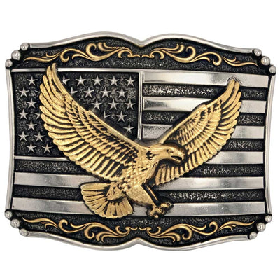Soar with pride when you attach this stunning buckle to a favorite belt. The Soaring Liberty Attitude Buckle is expertly crafted from Silver and gold over a white metal alloy with painted accents with the American flag and bald eagle. This buckle celebrates the American spirit and pride. It's size is approx. 4" across x 3" tall and fits 1 1/2" belts. Available at our Smyrna, TN just a short drive from downtown Nashville.
