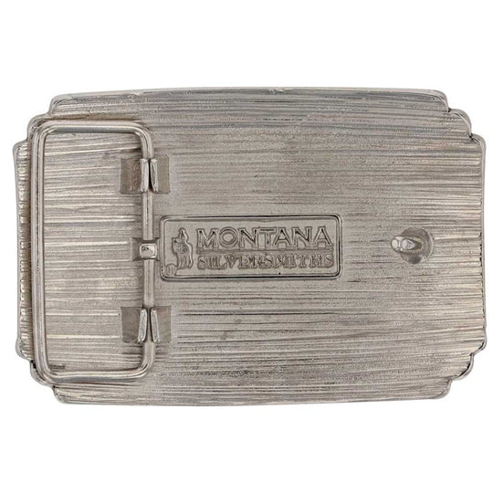 If Country Strong is your refrain you will love this handsome belt buckle. Its silver tone design features a cowboy hat paired with horns for a bold look. Filigree, stars, and beading fill in the spaces to create a stunning and unique design. Fits 1 1/2" belts and is approx. 2 3/4" tall x 4" across. Available at our shop just outside Nashville in Smyrna, TN. Made by Montana Silversmith.