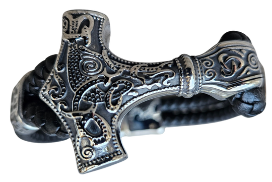 Norse style pattern on a Stainless Steel accents and a secure magnetic clip. Slightly oversized leather braided cord gives you nice fit. Now at our Smyrna, TN shop a short drive from Opry Mills Mall.
Approx. 8.5" L