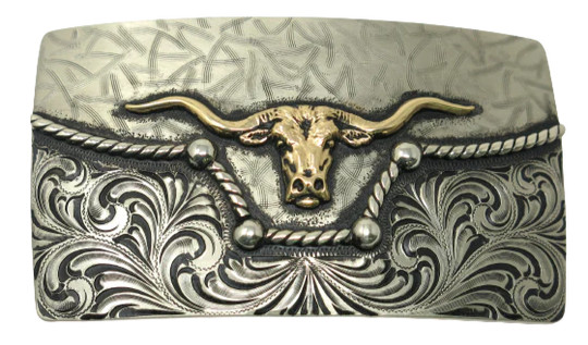 The River Horn impresses with an idea of a longhorn cattle neck deep in a river. In German Silver, the lower half of buckle is engraved in swirls forced from the center. It is separated from the lightly patterned top half with a rope dipping in the center to reveal the brass colored head of a Longhorn cattle. Available in our Smyrna, TN shop, a short distance from Nashville.
