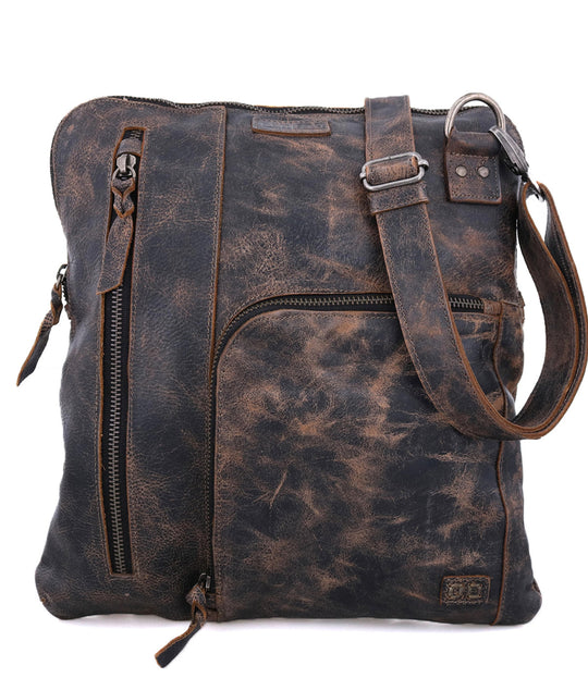 The Aiken is a convertible crossbody bag made from Artisan veg-tanned leather.  Secure metal zip-top closure, and 3 exterior zip pockets, all with security tabs. One pocket is conveniently placed on the front with credit card and pen slots. An adjustable crossbody strap is removable to switch up bag’s rotation. Aiken is organic cotton lined with 2 slip pockets inside and one larger zippered pocket. 
12L x 13H x 1W
Handmade in Leon, Mexico
Made by Bed/Stu. Stocked in our Smyrna, TN shop.
