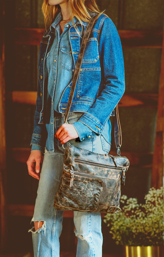 The Aiken is a convertible crossbody bag made from Artisan veg-tanned leather.  Secure metal zip-top closure, and 3 exterior zip pockets, all with security tabs. One pocket is conveniently placed on the front with credit card and pen slots. An adjustable crossbody strap is removable to switch up bag’s rotation. Aiken is organic cotton lined with 2 slip pockets inside and one larger zippered pocket. 
12L x 13H x 1W
Handmade in Leon, Mexico
Made by Bed/Stu. Stocked in our Smyrna, TN shop.