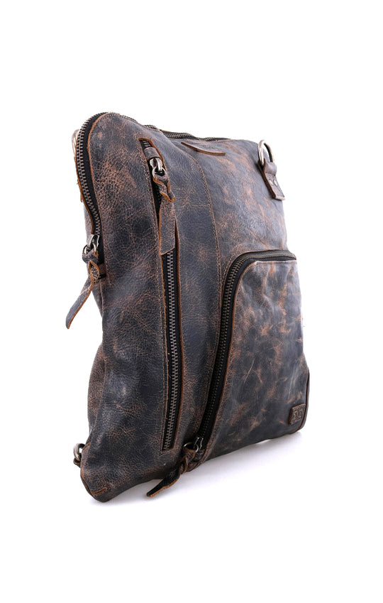 The Aiken is a convertible crossbody bag made from Artisan veg-tanned leather.  Secure metal zip-top closure, and 3 exterior zip pockets, all with security tabs. One pocket is conveniently placed on the front with credit card and pen slots. An adjustable crossbody strap is removable to switch up bag’s rotation. Aiken is organic cotton lined with 2 slip pockets inside and one larger zippered pocket. 
12L x 13H x 1W
Handmade in Leon, Mexico
Made by Bed/Stu. Stocked in our Smyrna, TN shop.