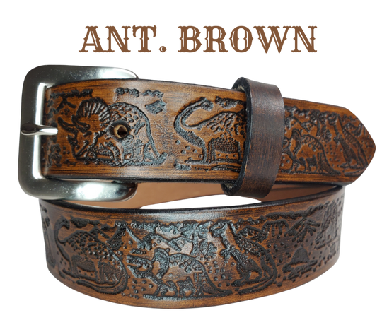 Our Lil Dino is perfect who love Dinosaurs! Full grain American vegetable tanned cowhide approx. 1/8"thick. Width is 1 1/4" and includes Antique Nickle plated Solid Brass buckle. We Hand Finish with each belt. Edges are smooth burnished painted edges. Made in our Smyrna, TN, USA shop. Buckle snaps in place for easy changing if desired. 