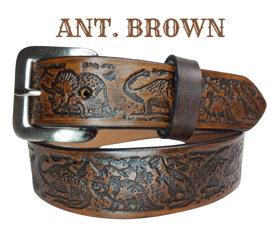 Our Lil Dino is perfect who love Dinosaurs! Full grain American vegetable tanned cowhide approx. 1/8"thick. Width is 1 1/4" and includes Antique Nickle plated Solid Brass buckle. We Hand Finish with each belt. Edges are smooth burnished painted edges. Made in our Smyrna, TN, USA shop. Buckle snaps in place for easy changing if desired. 