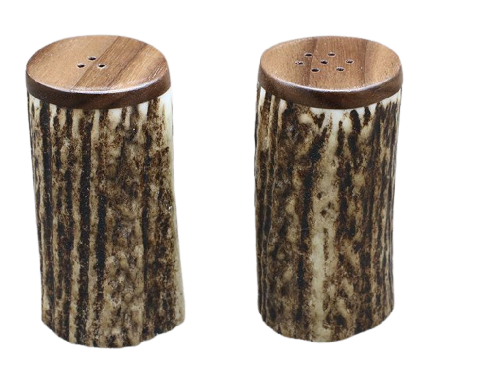 Handcrafted Antler Salt and Pepper Shaker set Made in U.S.A. Measures 3" tall x1 3/4" diameter top. Made from naturally shed elk and deer antlers with Walnut top and antler base. Sizes, colors and shape will vary. Made in the U.S.A. Get yours at our Smyrna, TN shop not far from Franklin.