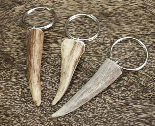 Handcrafted Antler Tip key chains. Approximate size: 2.5" long keychain from naturally shed elk and deer antlers. Sizes, colors and shape will vary. Made in the U.S.A. Get yours at our Smyrna, TN shop not far from Franklin.