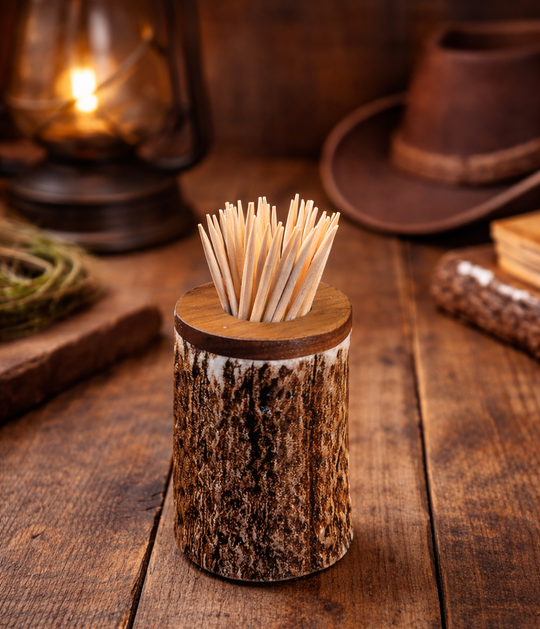 Handcrafted Antler Toothpick Holder. Approximate size: 2 1/2" tall x 1 3/4" diameter. Made from naturally shed elk and deer antlers. Sizes, colors and shape will vary. Made in the U.S.A. Get yours at our Smyrna, TN shop not far from Franklin.