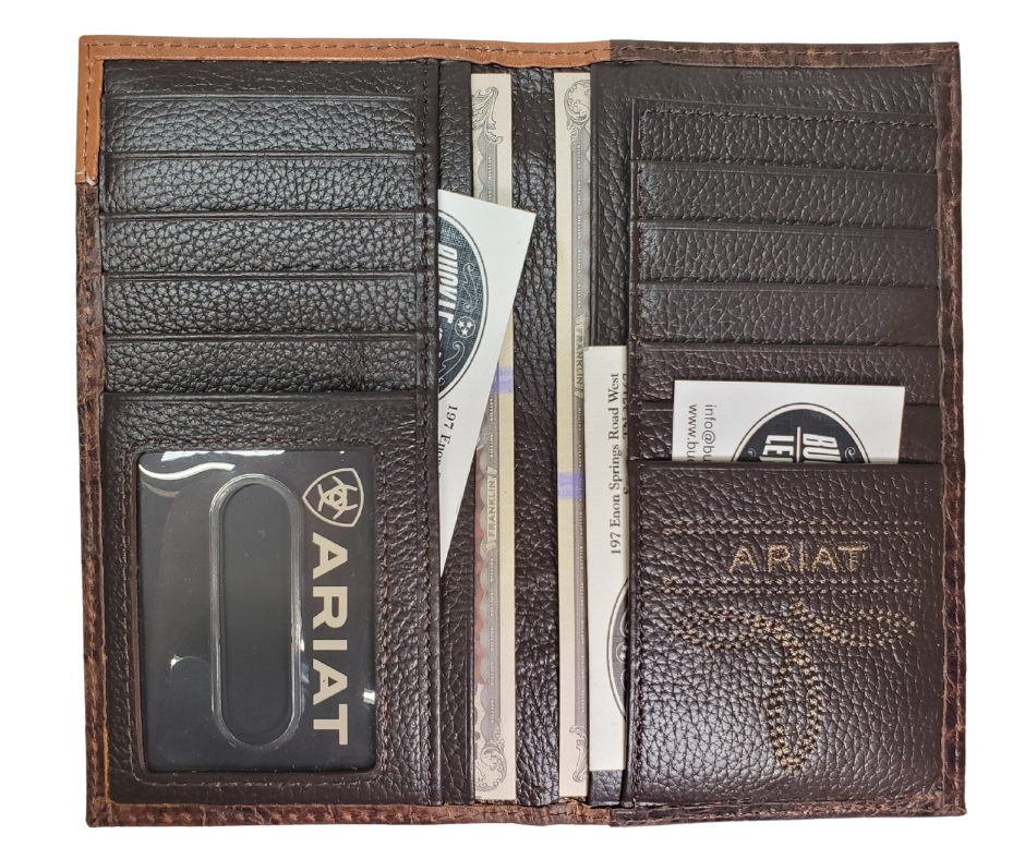 Ariat Rodeo/Roper style wallet
Crocodile embossed cowhide, Tooled Western Floral Accent on top.
11 credit card slots, clear driver's license slot
4 inside cash pockets, 1 on back (see pics)
Folded wallet measures 7" tall by 3" wide
Available at our Smyrna, TN shop just a short drive from World Famous Downtown.