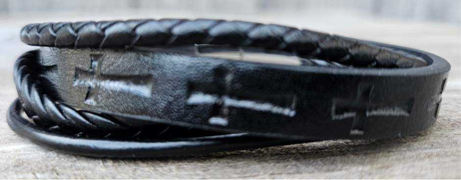 Multi leather strand bracelet with a easy connecting magnetic clasp. Wear everyday or just when your hanging out with friends getting coffee. The Cross is a symbol of deliverance that you can state your faith in a simple way. "We believe" too at our Smyrna, TN shop not far from Salvation By Grace church.

Approx. 8" Length