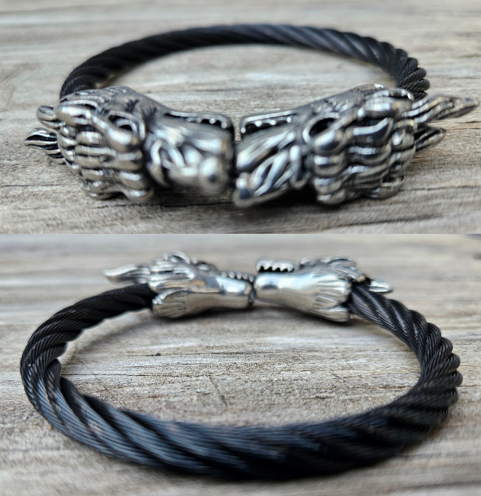 Stainless Steel Wolf head combined with a Black Steel Cable will get you noticed no matter where you are. Durable Stainless Steel last for years. Get yours now at our Smyrna, TN shop not far from Murfreesboro.

Approx. 8" with Wolf heads touching
Adjustable/Flexible cable