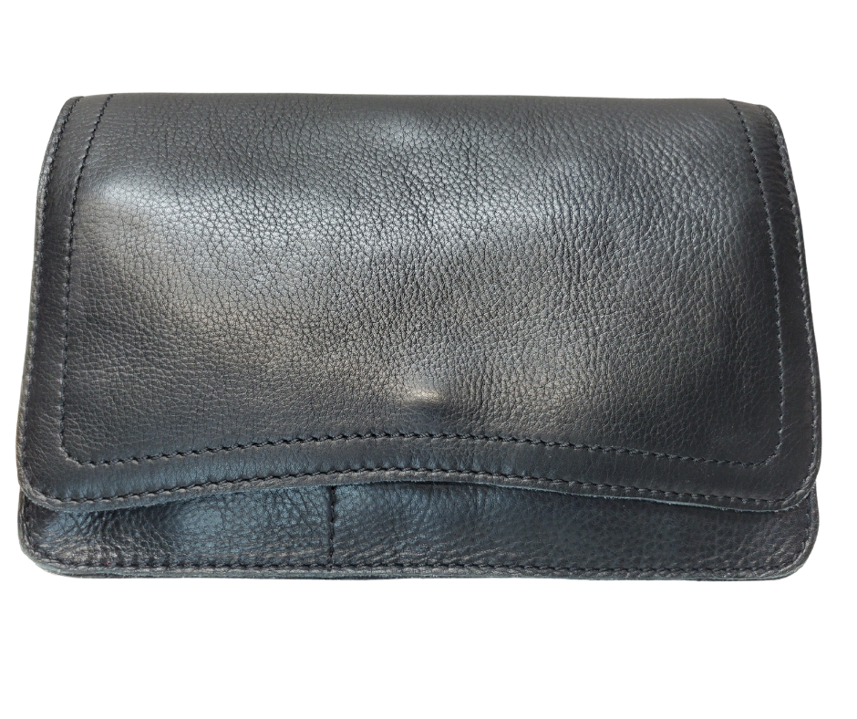 The Aubry leather handbag is available at our Smyrna, TN shop not far from Nashville. The main compartment zips closed, is lined with a sturdy fabric & has 5 inside card slots. Two stacked open pockets, a zippered pocket followed by 2 more slit pockets on the very front. All gets covered by a large flap with a magnetic clasp. On the backside of this organizers dream is yet another open pocket held in place with a narrow piece of leather with a magnetic closure.
Bag size: 8.5” x5” x 2”
54" adjustable strap 