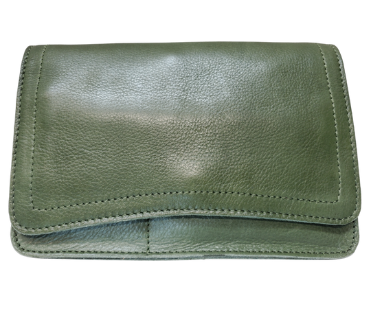 The Aubry leather handbag is available at our Smyrna, TN shop not far from Nashville. The main compartment zips closed, is lined with a sturdy fabric & has 5 inside card slots. Two stacked open pockets, a zippered pocket followed by 2 more slit pockets on the very front. All gets covered by a large flap with a magnetic clasp. On the backside of this organizers dream is yet another open pocket held in place with a narrow piece of leather with a magnetic closure.
Bag size: 8.5” x5” x 2”
54" adjustable strap 