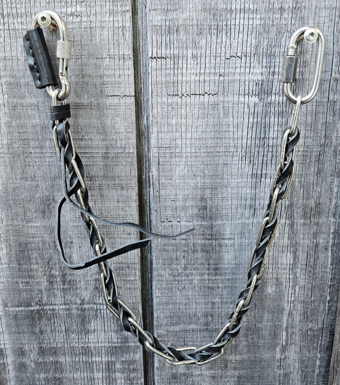 Leather and Steel makes for a Rugged yet classic look. The Stainless Steel chain has Leather laced thru the links to create a edgy Rocker/Biker look. Stainless Steel is durable yet always looks great. Get yours at our Smyrna, TN store not far from Boswells in Nashville.

24"Length