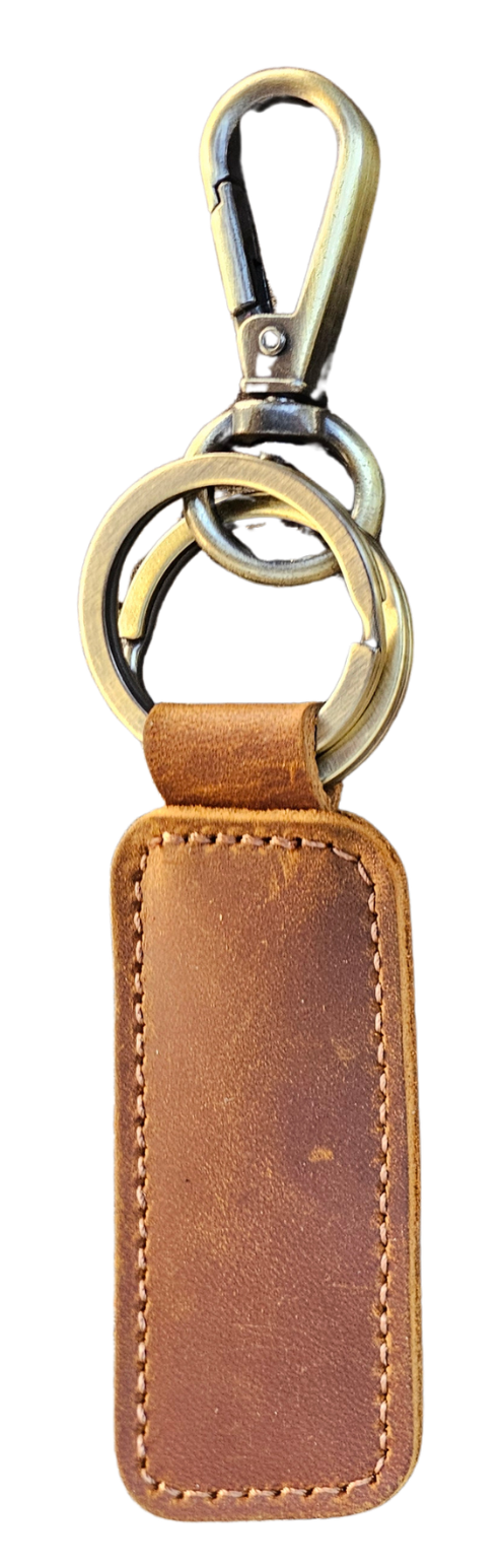 The Axis keychain is made of top-quality leather. A perfect accessory for organizing your car keys, home keys, and office keys, making it an ideal solution for keeping your keys in one place. Part of our new Home accessories at our Smyrna, TN shop.