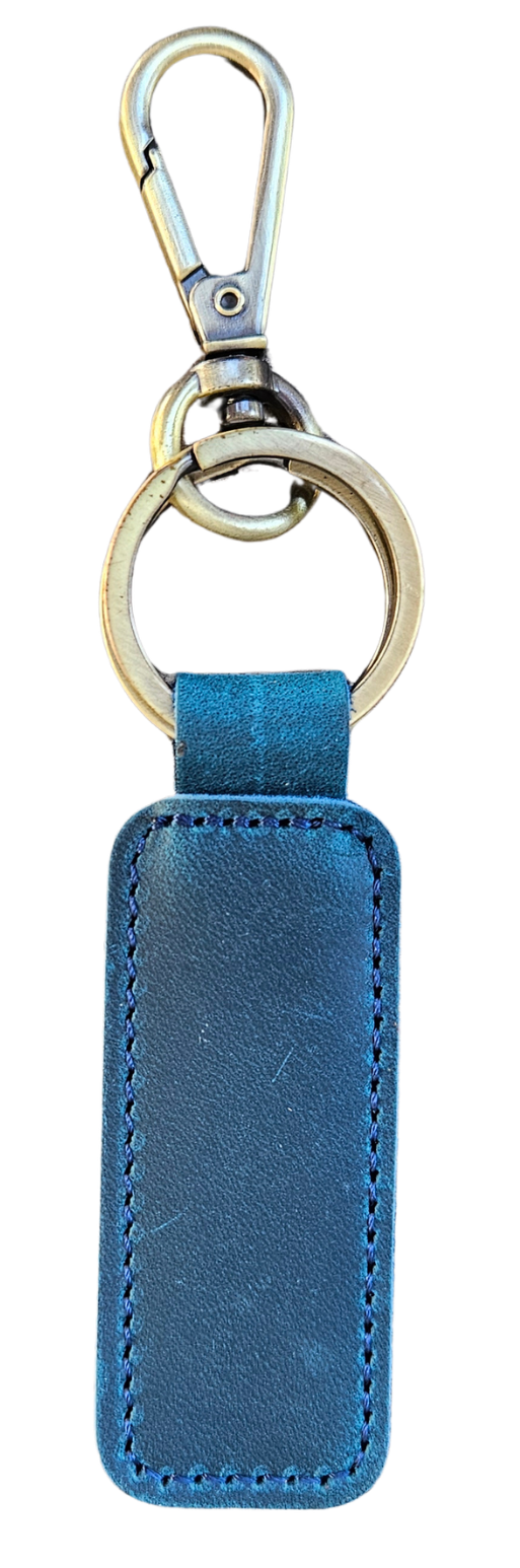 The Axis keychain is made of top-quality leather. A perfect accessory for organizing your car keys, home keys, and office keys, making it an ideal solution for keeping your keys in one place. Part of our new Home accessories at our Smyrna, TN shop.