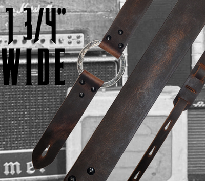 Great Musicians, Singers and great songs have been a staple for years in Nashville. Be on your way starting your journey with this  Vintage styled 1 3/4" "main Body of the Guitar strap is approx. 1/8" thick with a Scroll pattern stainless steel ring. Choose solid Black or Distressed Brown. The classic adjustment style goes from approx. 42" to 56" at it's longest . Made just outside Nashville in our Smyrna, TN. shop. It will need a bit of time to "break in" but will get a great patina over time. 