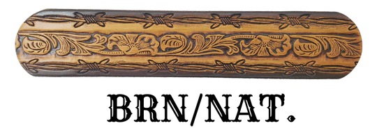 The "Bandit" Name Belt is perfect for those seeking an epic escape. It's handcrafted in Smyrna, Tennessee, just outside Nashville, and features a 1 1/2" width with a strip of vegetable tanned leather. The bold design includes an embossed Barbwire border and Western Scroll center pattern, while the changeable solid brass buckle in antique nickel finish adds a rugged touch. Make your escape in style with this hand-stained belt.