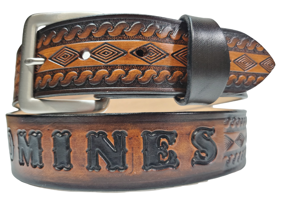 "The Banjo" is a handmade real leather belt made from a single strip of cowhide shoulder leather that is 8-10 oz. or approx. 1/8" thick. It has hand burnished (smoothed) edges and a Diamond center with a rope edge pattern. This belt is completely HAND dyed with a multi step finishing technic. The antique nickel plated solid brass buckle is snapped in place with heavy snaps.  This belt is made just outside Nashville in Smyrna, TN.