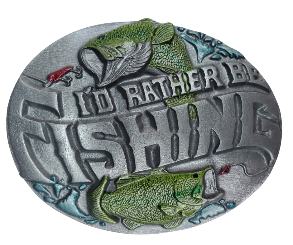 This buckle is for the big one that got away! This says it all for the fishing lover...I'd rather be fishing, complete with a fishing net, rod and reel, and of course the BIG one right on the front all on a oval shaped buckle. This pewter belt buckle that may be attached to your belt.  Fits 1 1/2" belts, Size approx. 3-1/2" x 2-3/4. Available online and in our shop just outside Nashville in Smyrna, TN.