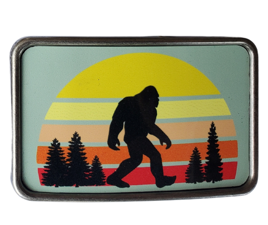 The Sunset Bigfoot is one of most unique belt buckles that are completely metal (image area too) and are made to be durable and lasting! Lots of details in the image and slightly smaller than most of our buckle selection. Available at our Smyrna, TN shop a short ride from downtown Nashville.

Belt Buckle Measures: -3"x2"
Fits any snap belt up to 1 1/2"
Listing is for the belt buckle only & does not include a belt strap.