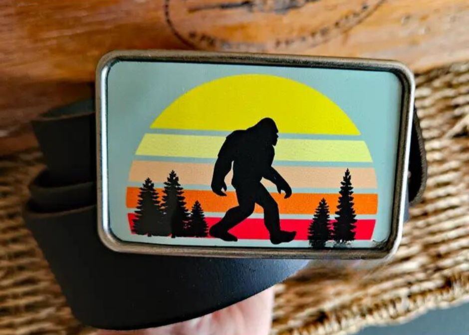 The Sunset Bigfoot is one of most unique belt buckles that are completely metal (image area too) and are made to be durable and lasting! Lots of details in the image and slightly smaller than most of our buckle selection. Available at our Smyrna, TN shop a short ride from downtown Nashville.

Belt Buckle Measures: -3"x2"
Fits any snap belt up to 1 1/2"
Listing is for the belt buckle only & does not include a belt strap.