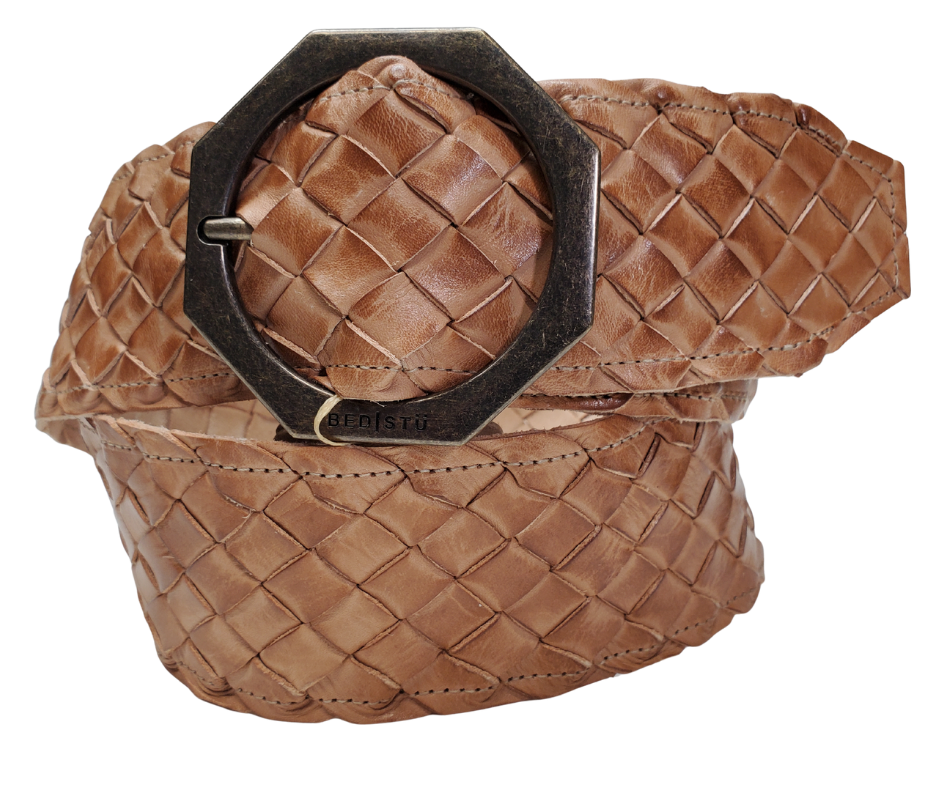 Tan - The Dreamweaver Wide braid distressed leather belt adorned with a octagon shaped metal buckle, the effortlessly infuses a touch of Vintage and Boho into your style. Whether worn on the waist or the hip, this belt stands as a remarkable addition to any wardrobe. Now stocked at our Smyrna, TN shop not far from 12th Ave. in Nashville.